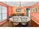 Elegant dining room with a decorative chandelier and stylish furnishings at 160 Syrr Run Rd, Saint George, SC 29477