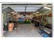 Organized garage space with ample lighting, storage, and plenty of room for vehicles or hobbies at 160 Syrr Run Rd, Saint George, SC 29477