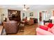 Open-concept living space featuring hardwood floors and plenty of seating at 160 Syrr Run Rd, Saint George, SC 29477