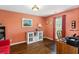 A charming office space with wood floors, plenty of natural light, and a desk area at 160 Syrr Run Rd, Saint George, SC 29477