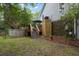 Backyard featuring stairs leading to a deck, offering outdoor living space with a view of the yard at 1604 Macoma Dr, Mount Pleasant, SC 29466