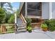 Spacious wooden deck with steps and views of lush landscaping at 1604 Macoma Dr, Mount Pleasant, SC 29466