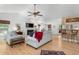 Spacious living room with hardwood floors, white paint, fireplace, and modern decor at 1604 Macoma Dr, Mount Pleasant, SC 29466