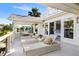 Expansive balcony featuring lounge chairs and views of the lush landscape, perfect for relaxation at 1635 Bull Creek Ln, Charleston, SC 29414