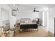 Inviting bedroom features a comfortable bed, cozy rug, and a bright workspace, creating a relaxing atmosphere at 1635 Bull Creek Ln, Charleston, SC 29414