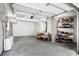 Spacious garage with ample storage space, clean concrete floor, and shelving at 1635 Bull Creek Ln, Charleston, SC 29414
