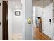 Hallway featuring hardwood floors and doors leading to the elevator and other areas of the home at 1635 Bull Creek Ln, Charleston, SC 29414