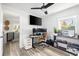 Bright home office with multiple monitors, a modern ceiling fan, and natural light at 1635 Bull Creek Ln, Charleston, SC 29414