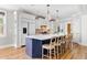 Open kitchen design with an island, stainless steel appliances, and hardwood floors at 1635 Bull Creek Ln, Charleston, SC 29414