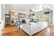 Cozy living room featuring a fireplace, hardwood floors, and comfortable seating for relaxed living at 1635 Bull Creek Ln, Charleston, SC 29414