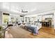 Bright and open living space with hardwood floors, a sectional sofa, and a view of the dining and kitchen at 1635 Bull Creek Ln, Charleston, SC 29414