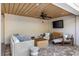 Comfortable covered patio seating with stylish furniture, ideal for relaxation and outdoor living at 1635 Bull Creek Ln, Charleston, SC 29414