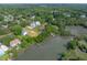 An aerial view shows surrounding area with homes and waterways at 1648 Secessionville Rd, Charleston, SC 29412
