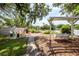 Beautiful backyard with a seating area, a swing overlooking the water, and a lush lawn at 1648 Secessionville Rd, Charleston, SC 29412