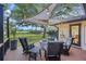 Expansive deck offering outdoor seating, a fire pit, and backyard views beyond the deck, providing a serene retreat at 1673 Mcclain St, Charleston, SC 29407