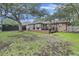 Spacious backyard featuring a deck, ideal for outdoor entertaining and relaxation at 1673 Mcclain St, Charleston, SC 29407