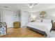 Bright bedroom featuring a ceiling fan, hardwood floors, and neutral paint at 1673 Mcclain St, Charleston, SC 29407