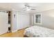 Bedroom featuring hardwood floors, neutral paint, and closet storage at 1673 Mcclain St, Charleston, SC 29407