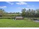 Inviting backyard dock for leisure or fishing, complemented by stunning canal views at 1673 Mcclain St, Charleston, SC 29407