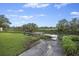 Concrete boat launch and backyard dock for easy canal access and waterside enjoyment at 1673 Mcclain St, Charleston, SC 29407