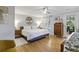 Bright and inviting bedroom featuring hardwood floors and ample natural light at 1673 Mcclain St, Charleston, SC 29407