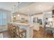 Open-concept kitchen with granite countertops, island, breakfast bar and stainless appliances at 1822 Grovehurst Dr, Charleston, SC 29414