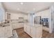 Spacious kitchen with white cabinetry, granite counters, and stainless steel appliances at 1822 Grovehurst Dr, Charleston, SC 29414
