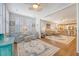 Open-concept living space featuring hardwood floors, ceiling fans, and a smooth transition to the kitchen at 1822 Grovehurst Dr, Charleston, SC 29414