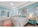 Bright main bedroom featuring a cozy sitting area and a decorative chandelier at 1822 Grovehurst Dr, Charleston, SC 29414