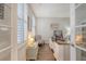 Bright office featuring natural light, a modern desk setup, and charming decor at 1822 Grovehurst Dr, Charleston, SC 29414