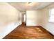 Bedroom showcasing hardwood floors, a neutral color scheme and a large window at 1871 Grimball Rd, Charleston, SC 29412