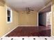 Open-concept dining area with a ceiling fan, hard wood floors, and easy access to the kitchen and living area at 1871 Grimball Rd, Charleston, SC 29412