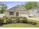 Charming home with beautifully landscaped front yard and attached garage, great curb appeal at 201-B Mcmakin Dr, Summerville, SC 29483