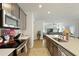 Modern kitchen with stainless steel appliances, sleek countertops and open layout at 201-B Mcmakin Dr, Summerville, SC 29483