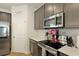 Modern kitchen with stainless steel appliances and ample cabinet space for storage at 201-B Mcmakin Dr, Summerville, SC 29483