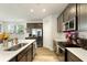 Modern kitchen with stainless steel appliances, plenty of countertop space, and a bright window at 201-B Mcmakin Dr, Summerville, SC 29483