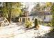 Spacious backyard featuring a play set and a patio with table and chairs at 203 Weiters St, Walterboro, SC 29488