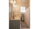 Charming bathroom with unique patterned floors, stylish vanity, and shower with curtain at 203 Weiters St, Walterboro, SC 29488