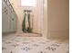 Bathroom with unique patterned floors, stylish vanity, and shower with curtain at 203 Weiters St, Walterboro, SC 29488