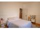Bedroom features natural light, neutral colors, and a play kitchen at 203 Weiters St, Walterboro, SC 29488