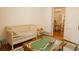 Bright ' bedroom featuring a crib, toy box, and train table near a dining area at 203 Weiters St, Walterboro, SC 29488
