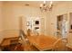 Dining room with wood floors, a wooden table and view to the living room at 203 Weiters St, Walterboro, SC 29488
