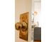 Close up of a brass door knob and latch on a white painted door at 203 Weiters St, Walterboro, SC 29488