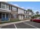 Inviting brick and vinyl townhome featuring private entrances and designated parking at 2045 Rondo St # B, Charleston, SC 29414