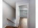 Stairway and open door to a room with wood flooring and a window at 2045 Rondo St # B, Charleston, SC 29414