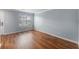 Cozy living room with hardwood floors, natural light, and convenient entryway at 2045 Rondo St # B, Charleston, SC 29414