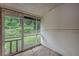 Enclosed porch with large windows providing natural light and views of the outdoors at 2045 Rondo St # B, Charleston, SC 29414