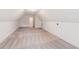 Spacious carpeted bonus room with vaulted ceilings and fresh white paint at 206 Almond Ct, Summerville, SC 29483