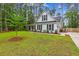 Well-maintained home with a large, lush lawn, mature trees, and charming curb appeal at 206 Almond Ct, Summerville, SC 29483