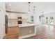 Modern kitchen boasting white cabinets, granite countertops, and stainless steel appliances at 206 Almond Ct, Summerville, SC 29483